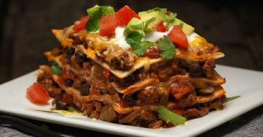 Sink your teeth into our Cheesy Mexican Lasagna tonight. This Cheesy Mexican Lasagna brings together all your favorite Tex-Mex flavors in a whole new way.